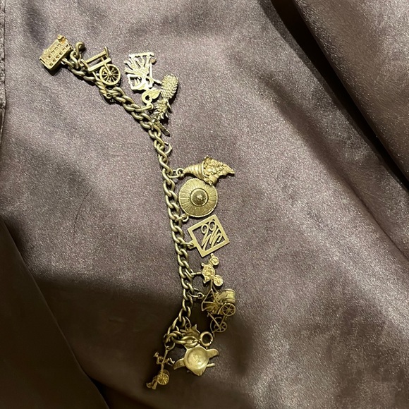 Neiman Marcus Jewelry - Neiman Marcus 925 Silver Charm bracelet ( Vintage 30 years ago)